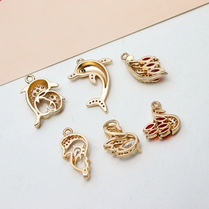 Gold-plated copper dolphin and swan charms with micro-paved zircons for DIY jewelry making