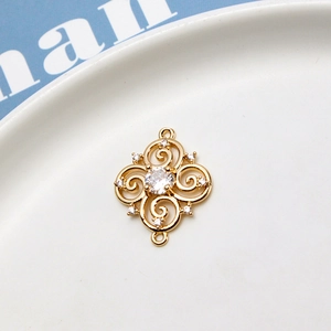 Macro shot of gold-plated baroque style cubic zirconia connector for DIY jewelry making