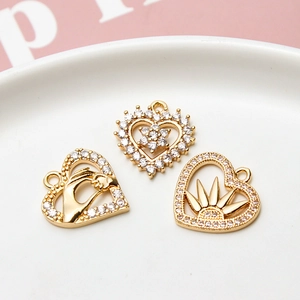 Three gold-plated heart charms with cubic zirconia for DIY jewelry making sets