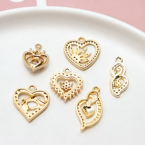 Gold-plated hollow heart and crown charms with zircon accents for DIY jewelry making