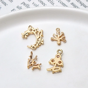 Golden DIY charms with moon tree and deer shapes featuring micro-set zircon accents