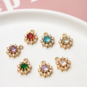 7-piece set of gold-plated snowflake pendants with colorful zircons for DIY jewelry making