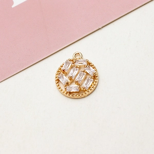 Close-up of gold-plated circular flower pendant with micro-set cubic zirconia crystals