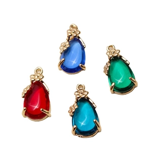 Waterdrop crystal pendants in red blue green colors with gold flower settings