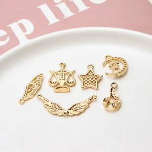 Set of 6 gold plated zircon wing and star charms for DIY jewelry making and craft projects
