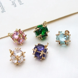 Colorful zircon cube pendants in gold cage settings for DIY jewelry making