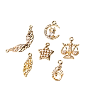 Gold-plated brass pendants with zircons in wing star and moon shapes for DIY jewelry