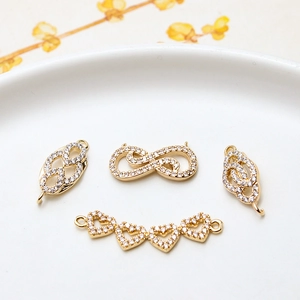 Connecteurs cœur et infini dorés avec zircons micro-pavés pour création de bijoux