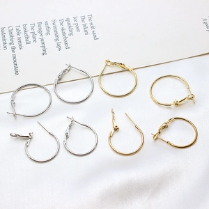 Detail of round gold and silver earring hoops in various sizes for DIY jewelry making