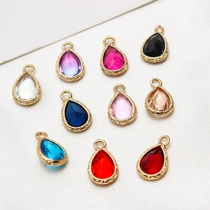 Ten colorful faceted water drop crystal pendants with gold-plated metal DIY jewelry edges