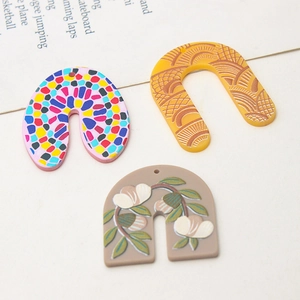 Retro U-shaped acrylic earrings with cherry blossom patterns and colorful mosaic designs