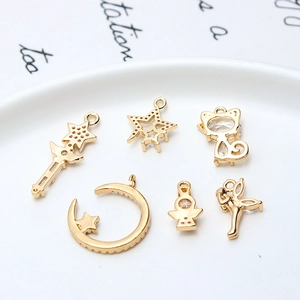 Golden moon and star cat pendants set with cubic zirconia for DIY jewelry making