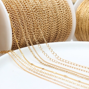 Macro detail of eight different gold-plated jewelry chains for DIY jewelry making accessories