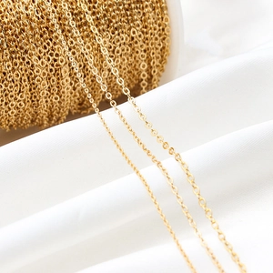 Detailed macro of gold plated oval link chains in three sizes for DIY jewelry making