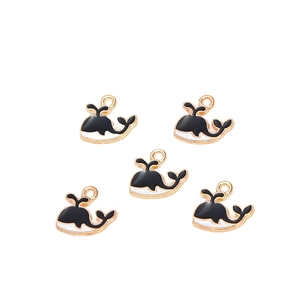 Set of 5 gold-plated whale charms with black and white enamel for DIY jewelry making