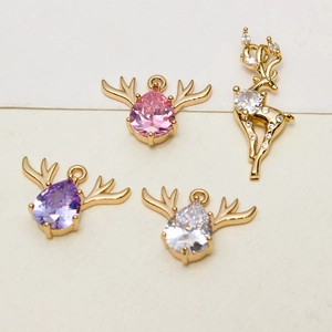 Detailed close-up of zircon deer head pendants in colorful crystal for DIY jewelry