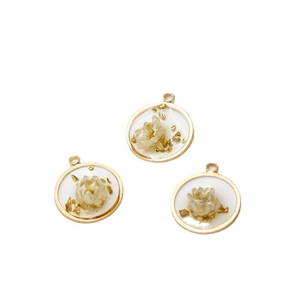 Copper-edged resin flower pendants with gold foil and dried flowers for DIY jewelry making