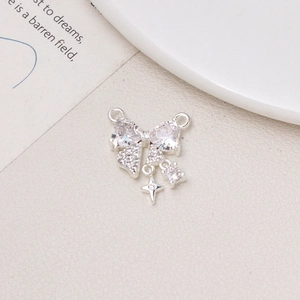 Ciondolo a fiocco argento con zirconia e nappe a stella per gioielli collana fai da te