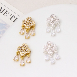 Gold and silver clover leaf charms with pear cut cubic zirconia tassels for DIY jewelry
