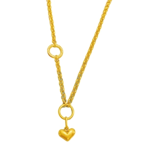 Collana in acciaio al titanio dorato con ciondolo a cuore, catena spessa e cristalli