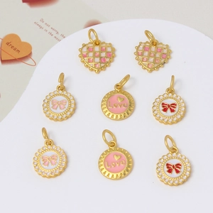 Charming gold-plated heart and bow pendants for DIY jewelry with pink enamel charms