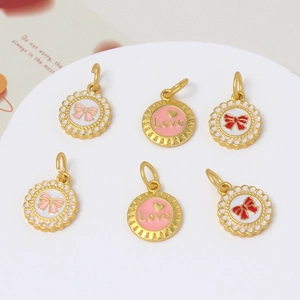 Detailed macro view of 6 pink and red enamel bow heart charms for DIY jewelry making