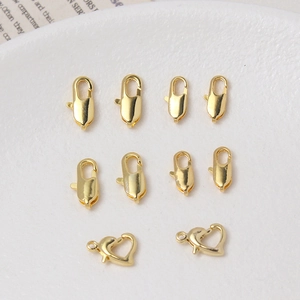 Chiusure a moschettone placcate oro 18K e fibbie a cuore per set di gioielli fai-da-te
