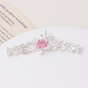 Detail of flower clasp with pink square zircon and magnetic closure for jewelry