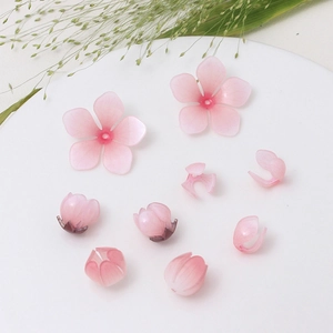 Petali e boccioli di fiori in resina rosa per creazione di accessori fai da te