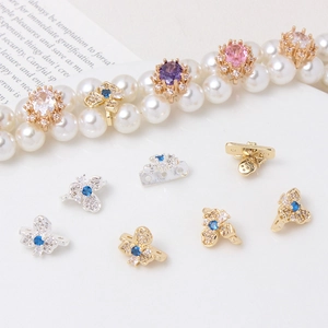 Copper gold plated oval snowflake spacers with micro-inlaid zircons on pearl bracelet