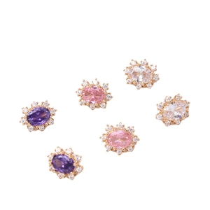 Oval micro-set zircon spacers in gold-plated copper with purple, pink, and white stones