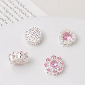 Hollow heart and floral pearl beads for jewelry making in gold-plated copper and pink stone