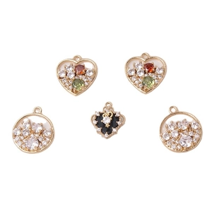 Five pieces of gold heart and round zircon charms for DIY jewelry making and craft projects