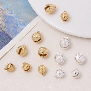 Gold and silver hollow embossed bells with floral patterns for DIY jewelry making