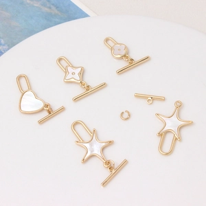 Fermoirs à bascule OT dorés avec nacre blanche en forme de cœur pour bijoux DIY