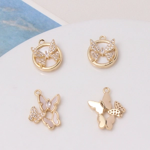 Gold plated butterfly shell pendants with white mother of pearl and pave crystals