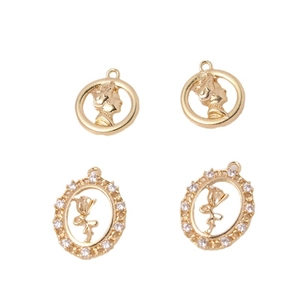 Gold plated copper pendants featuring white shell butterfly and rose flower relief