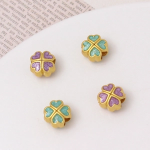 Antique gold four-leaf clover beads in green and purple for DIY jewelry making