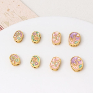 Cuentas ovaladas esmaltadas de flores con borde dorado y perlas para collares DIY