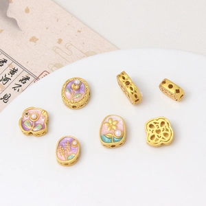 Cuentas de flores de esmalte dorado con perlas para crear collares DIY y joyería