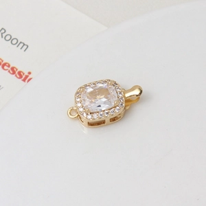 Macro shot of gold-plated rectangular cubic zirconia clasp for DIY jewelry making