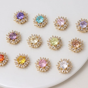 Macro view of multi-color sunflower zircon spacers for DIY jewelry making in gold plating