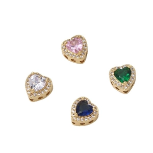 Four heart-shaped zircon charms in pink, green, white, and blue with gold plating