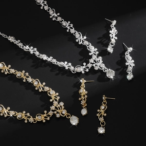 Elegant floral rhinestone wedding jewelry set with necklace and drop earrings in gold and silver