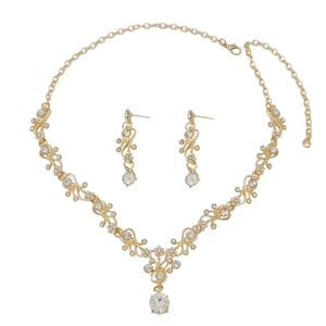 Elegant gold alloy necklace and earrings set with rhinestones and floral vine designs