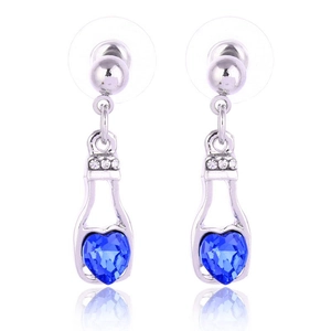 Elegante flesvormige zilveren oorbellen met blauw hartkristal en zirkonia accenten