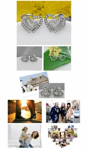 Detailed macro view of silver heart earrings with white cubic zirconia micro-pave setting