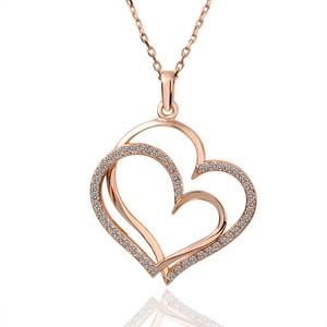 Elegant rose gold double heart pendant necklace with white crystals on a cross chain