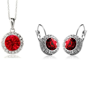 Parure de bijoux élégante avec pierres rondes rouges et cristaux blancs sur base argent