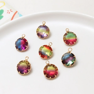Set of seven round faceted gradient resin charms with golden copper edges for DIY jewelry